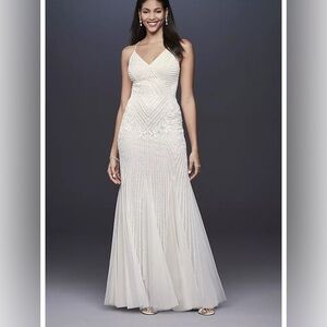 Dress worn once 2 years ago. During wedding I was 5 months pregnant